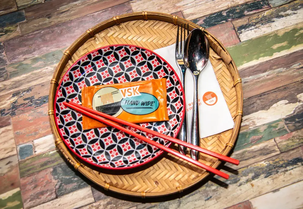 A table laid with sharing plates for a Christmas party at Vietnamese Street Kitchen Birmingham