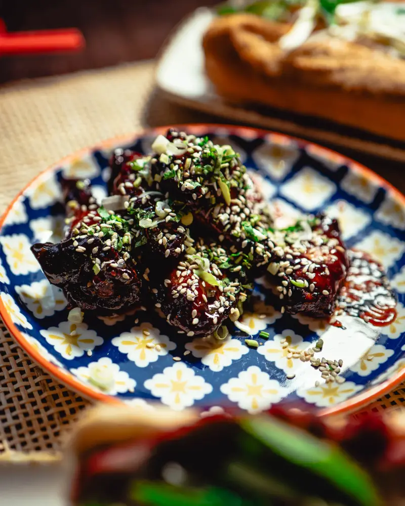 Sesame sweet wings — homemade sauce, herbs, toasted sesame